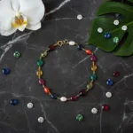 Navratna Bracelet (5–6 mm Natural Stones) in Pure Silver & Gold | नवरत्न चांदी / सोना ब्रेसलेट – 5–6 mm नैचुरल स्टोन्स