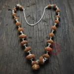 Close up nepali indra indrani rudraksha beads mukhi lines